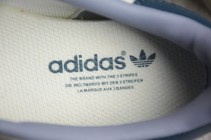 Gazelle branco-osso e azul-marinho