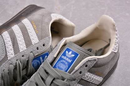 Gazelle cinza e branco