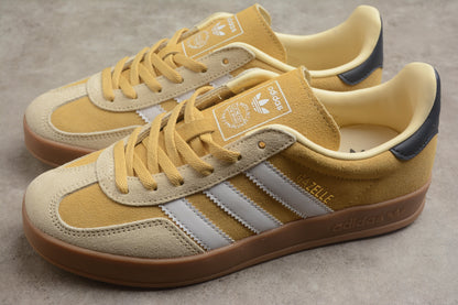 Gazelle amarelo, branco e azul-marinho