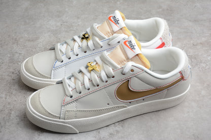 Blazer Low ’77 branco, dourado e vermelho