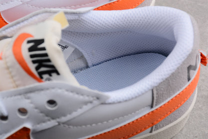 Blazer Low ’77 branco e laranja