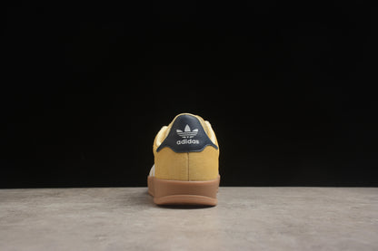 Gazelle amarelo, branco e azul-marinho