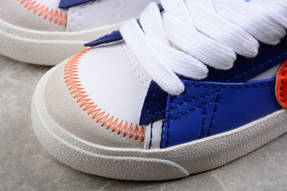 Blazer Low ’77 branco, azul e vermelho
