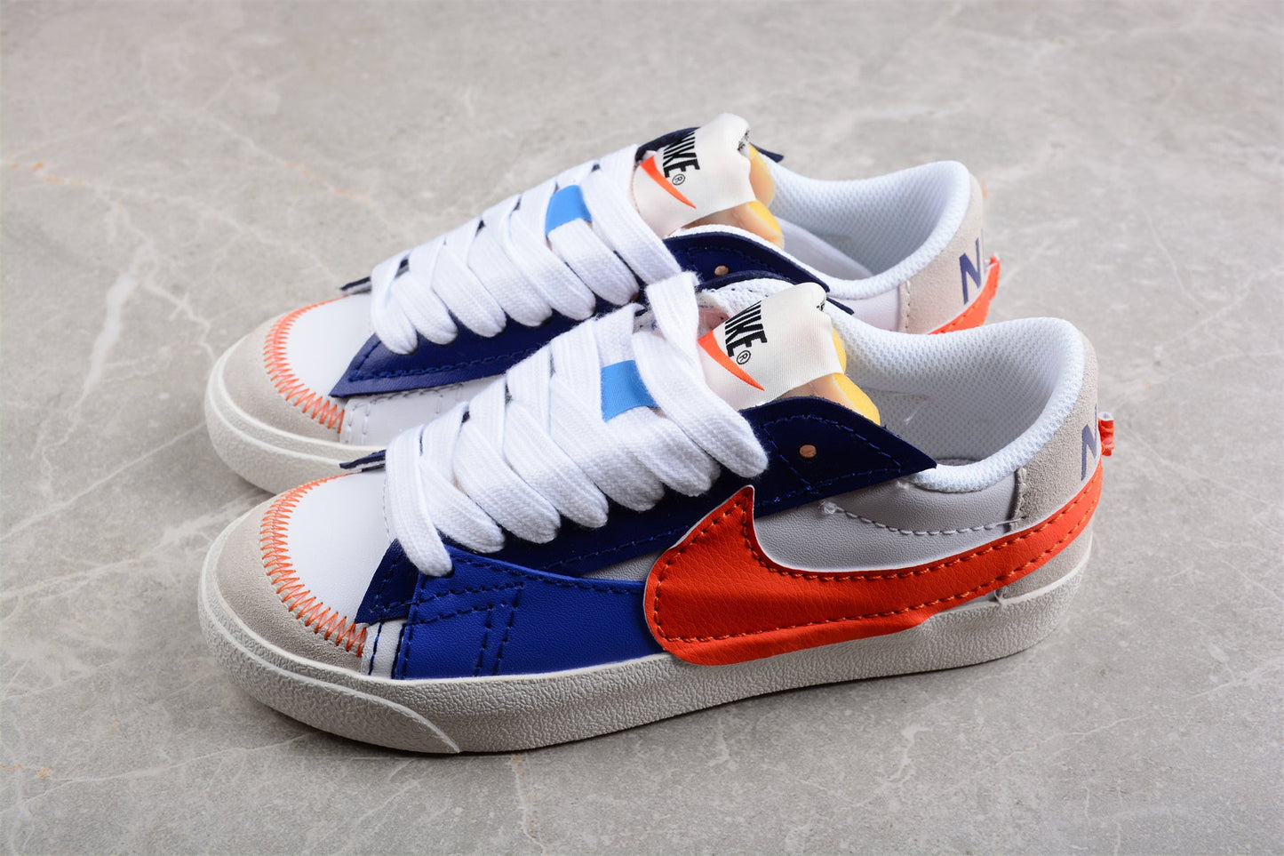 Blazer Low ’77 branco, azul e vermelho