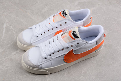 Blazer Low ’77 branco e laranja