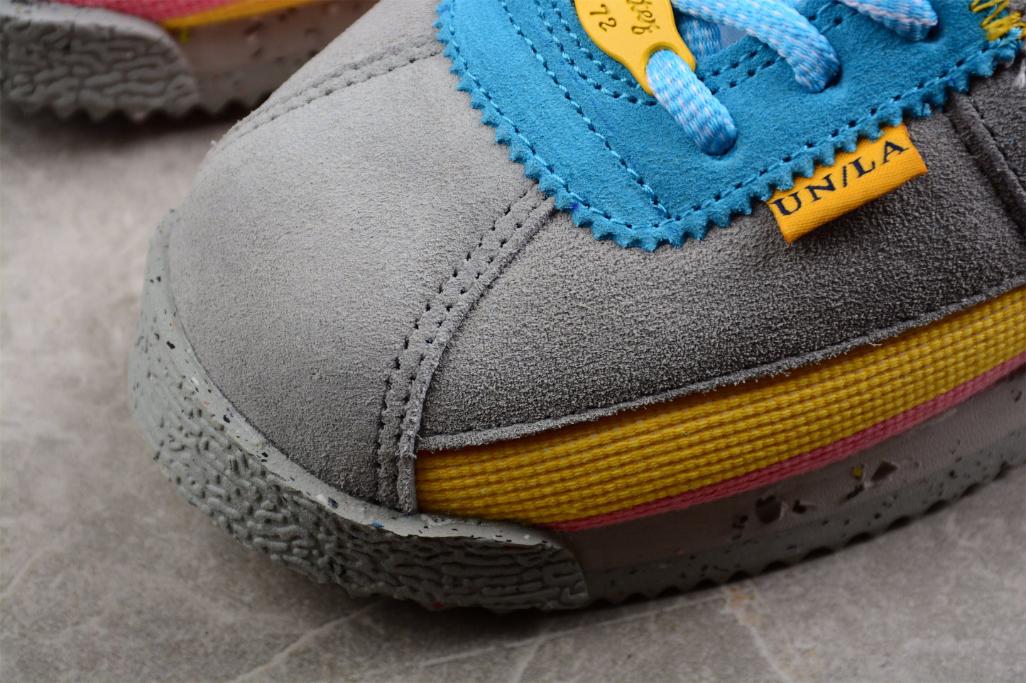 Cortez x Union LA cinzento, azul, amarelo e rosa
