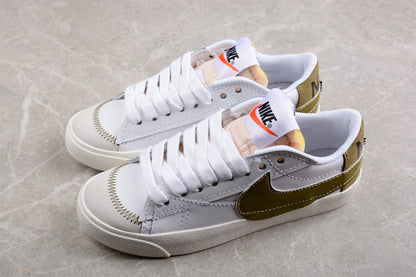 Blazer Low ’77 branco e dourado
