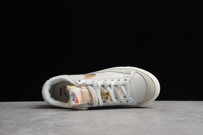Blazer Low ’77 branco, dourado e vermelho