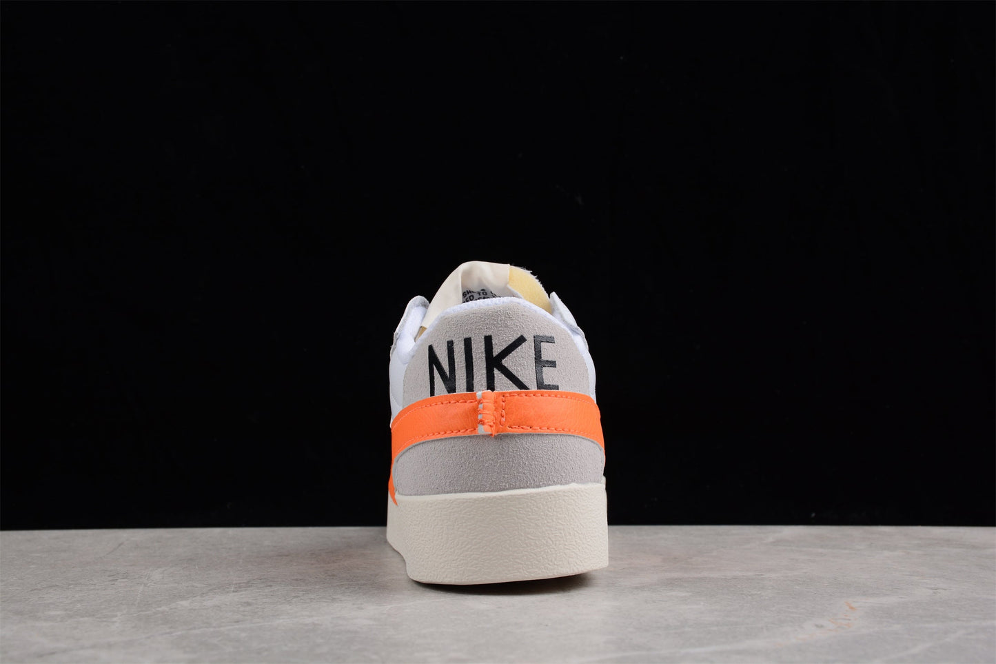 Blazer Low ’77 branco e laranja