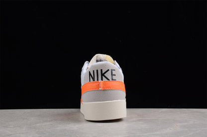 Blazer Low ’77 branco e laranja