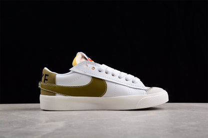 Blazer Low ’77 branco e dourado
