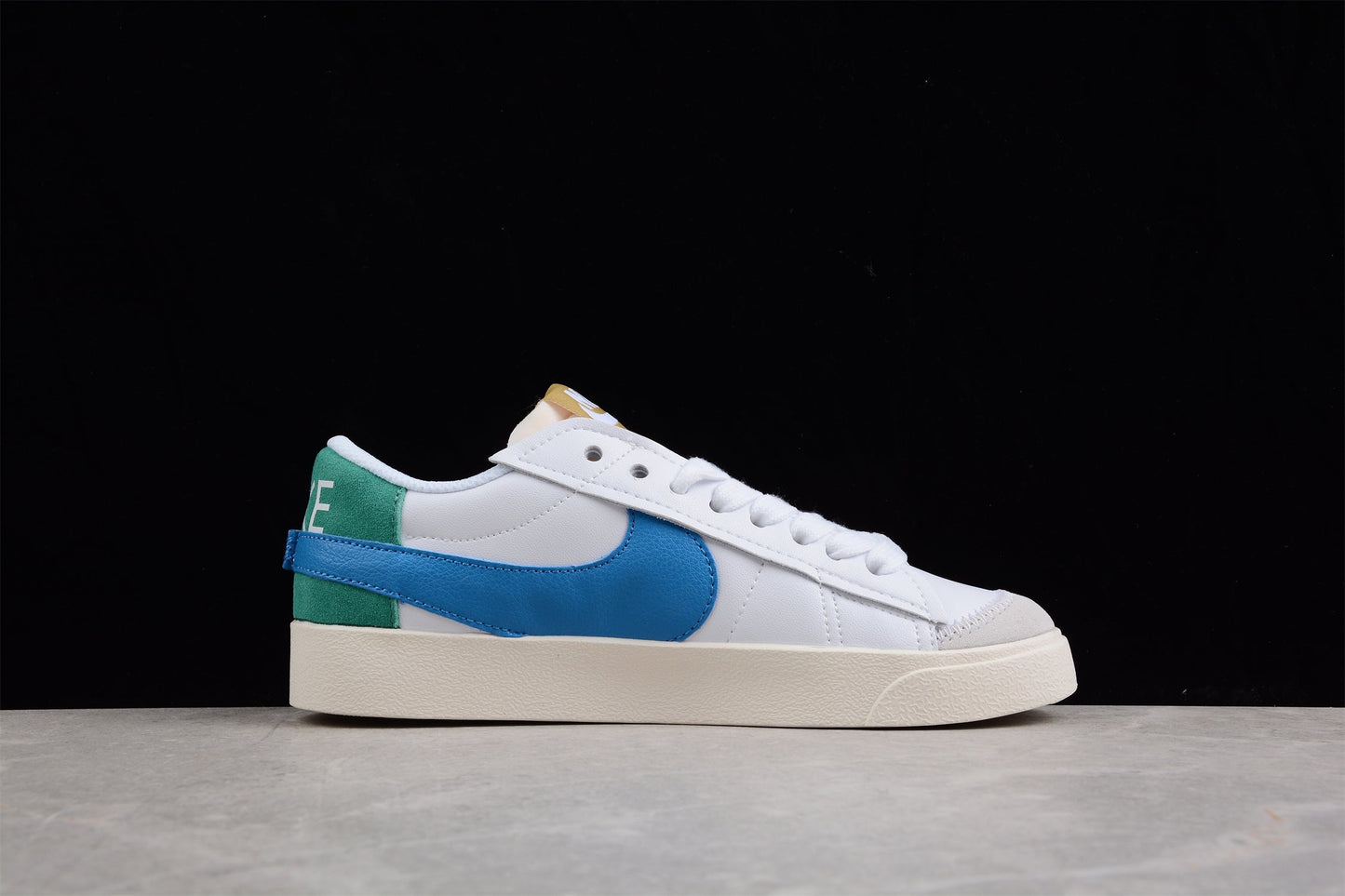 Blazer Low ’77 branco, verde e azul