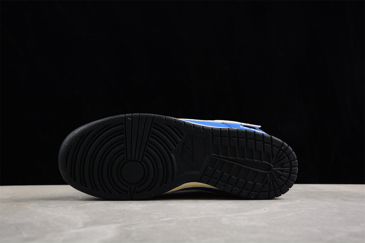 Dunk Low “Calsonic Nissan Impul” azul e branco