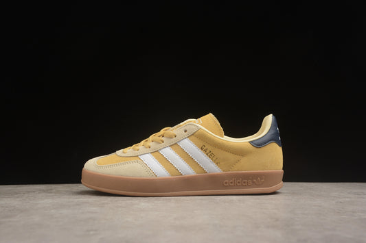 Gazelle amarelo, branco e azul-marinho