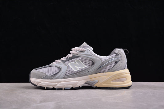 NB 530 cinza com sola creme