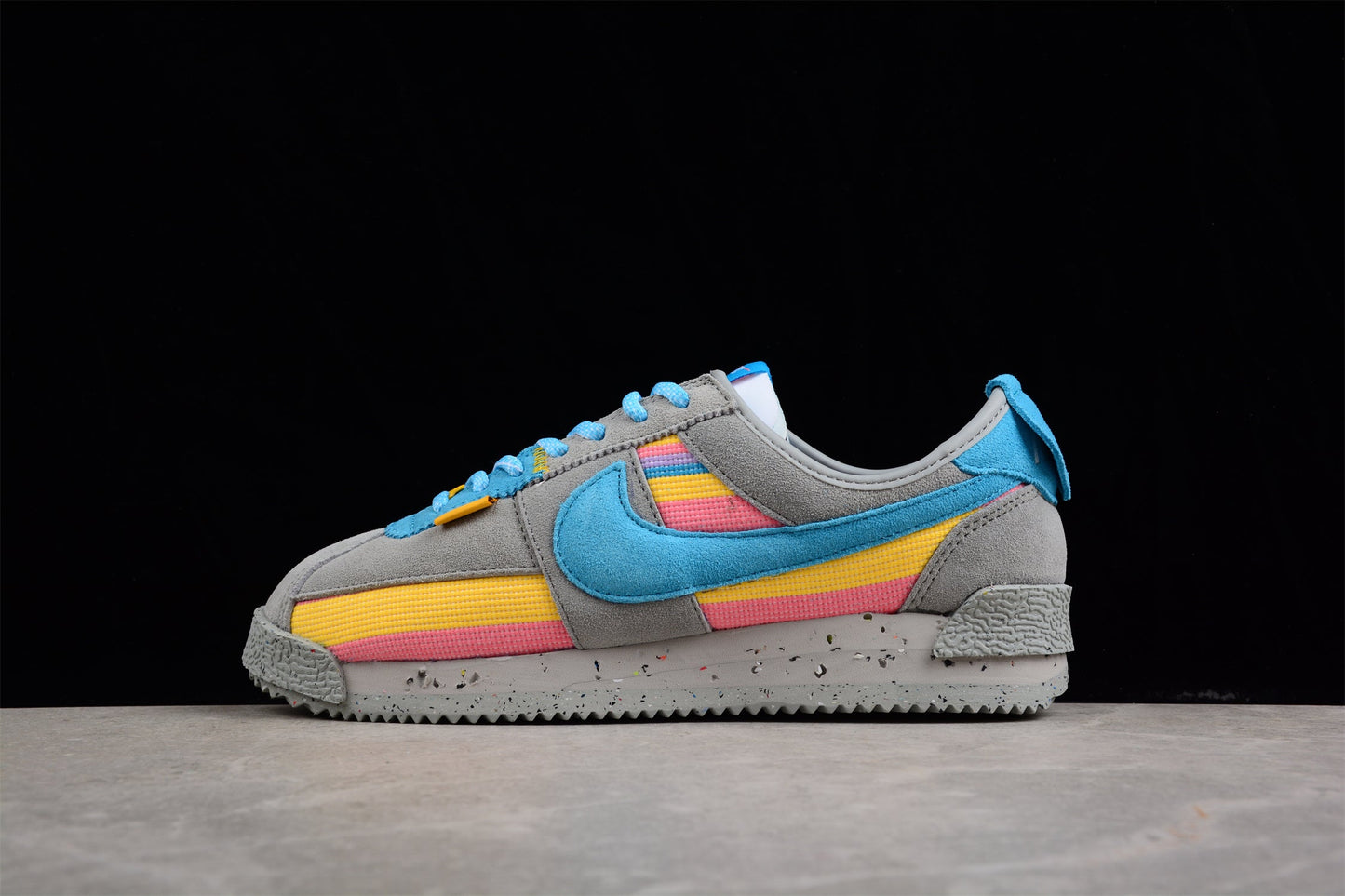 Cortez x Union LA cinzento, azul, amarelo e rosa